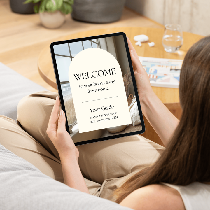Tablet displaying a welcome screen for an Airbnb guest guide.