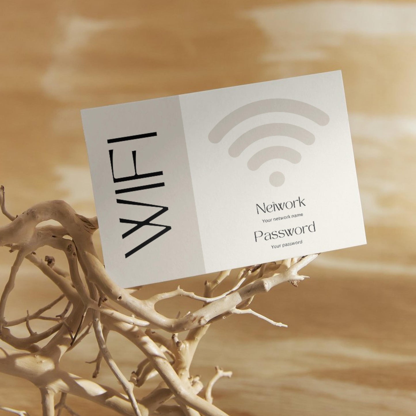 Minimalist WiFi card design, displaying placeholders for network name and password, propped on decorative driftwood against a warm wooden background.